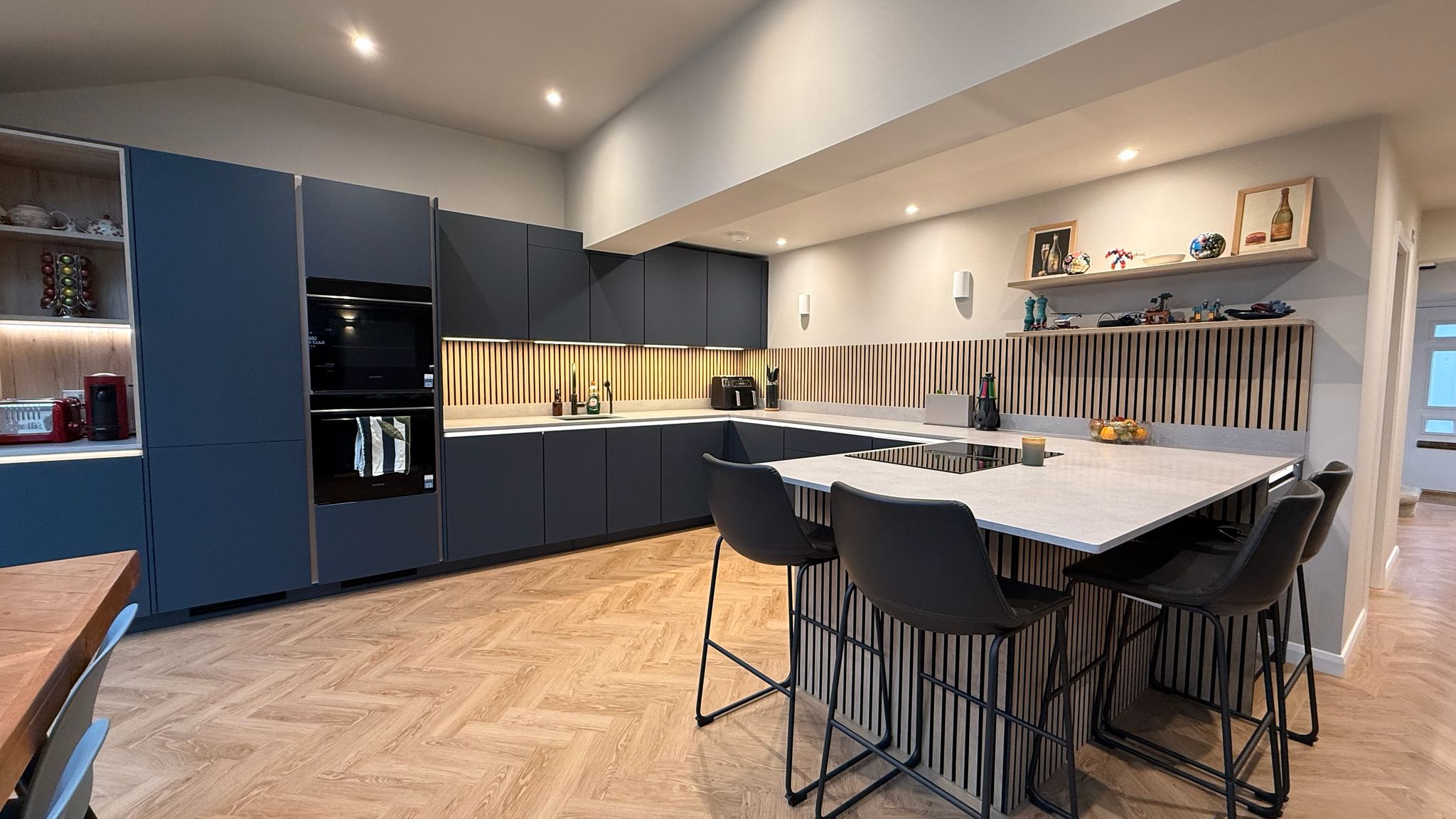 Matte blue handleless German-style kitchen fitted in Welwyn