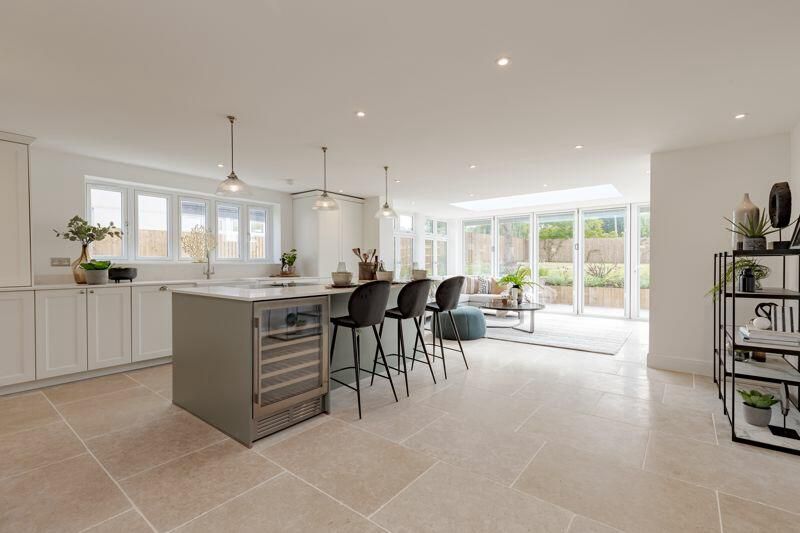 Open-plan white kitchen installation in Ware, Hertfordshire